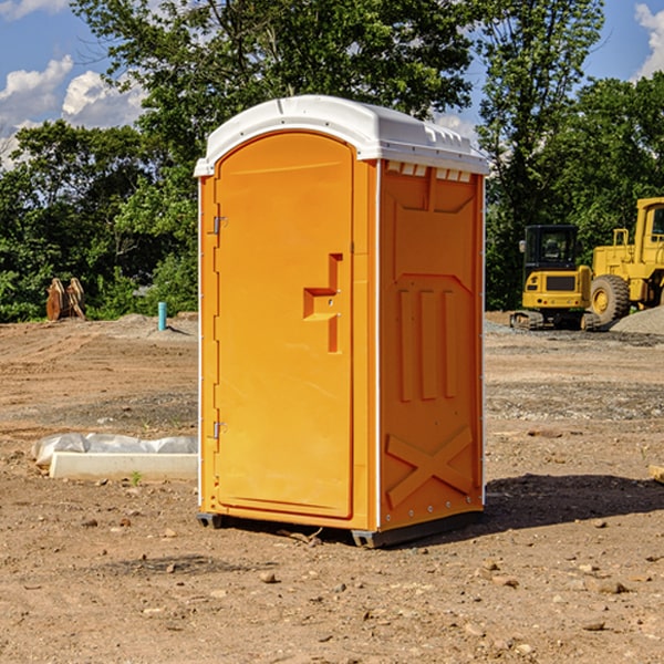 how often are the portable restrooms cleaned and serviced during a rental period in Swan Lake NY